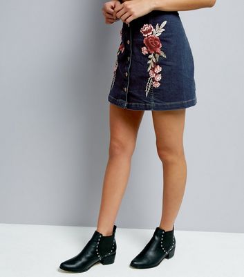 jean skirt with embroidered flowers