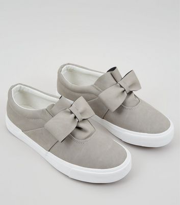 bow front slip on trainers