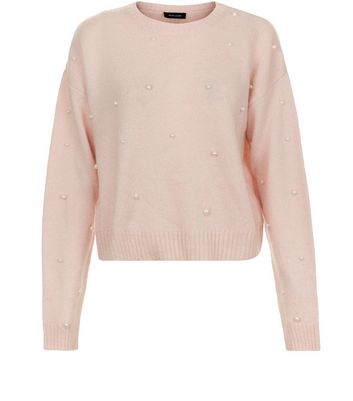 tan and white sweater