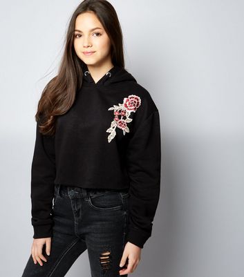 sweatshirts with flowers embroidered