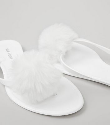 white jelly flip flops