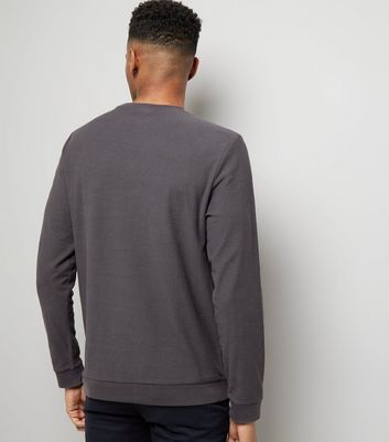 dark grey crew neck sweatshirt