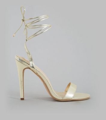 gold string up heels