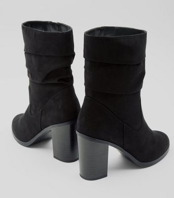 black heeled calf boots