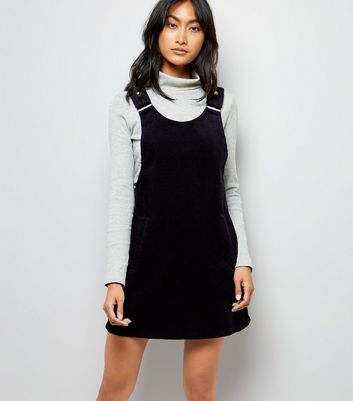 pinafore dress with boots