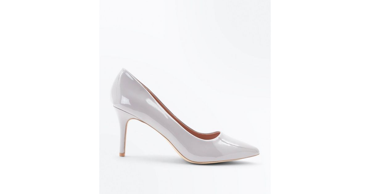 grey pointed court shoes