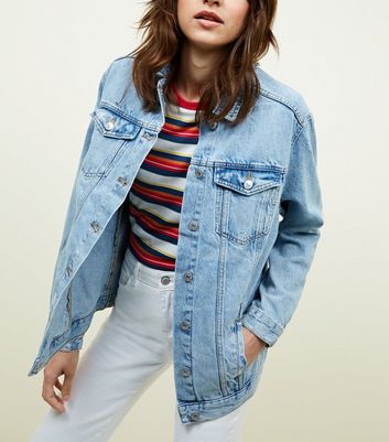 light wash distressed denim jacket