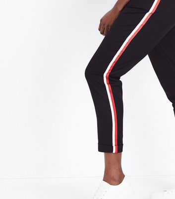 Black trousers red side stripe online