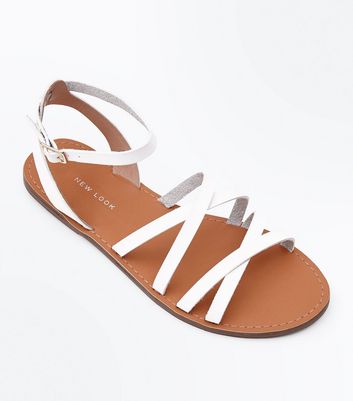 white flat gladiator sandals