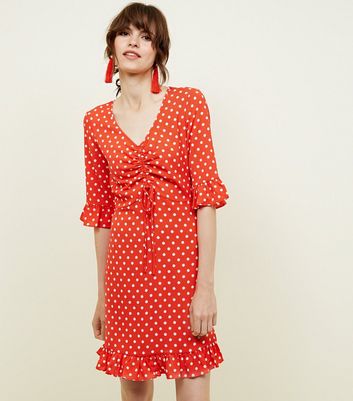 red polka dot tea dress