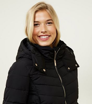 tall black faux fur coat
