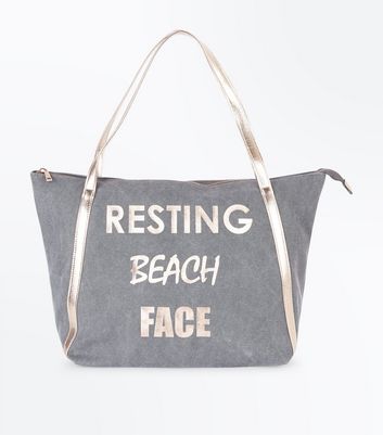 resting beach face tote