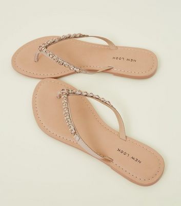 pink leather flip flops