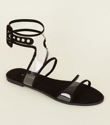 black and clear sandals