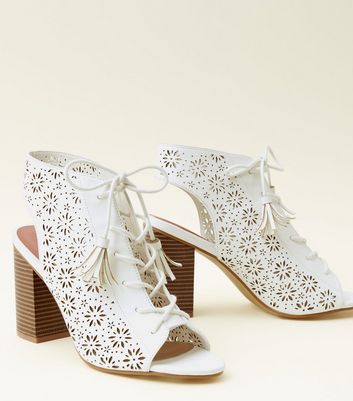 white laser cut shoes