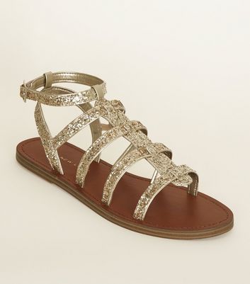 gold flat gladiator sandals