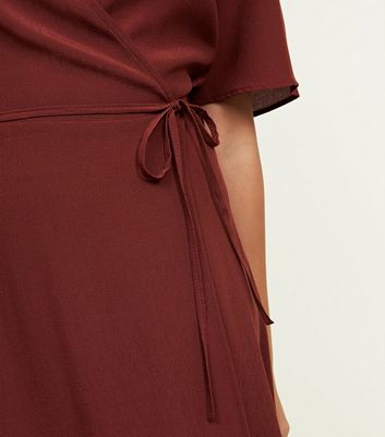 new look midi wrap dress in rust