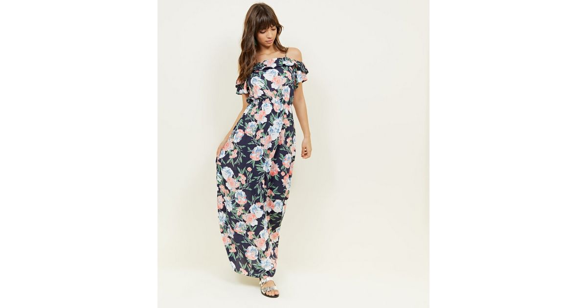 Robe longue bleu marine à épaules dénudées, à fleurs et bordure à