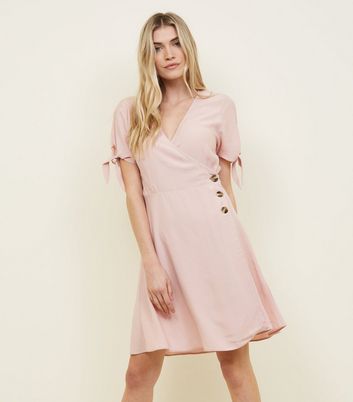 pastel pink wrap dress