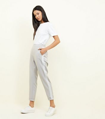 Grey trousers with store white side stripe