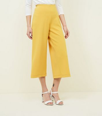 Mustard cropped hot sale trousers