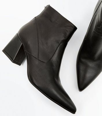 black leather pointed ankle boots