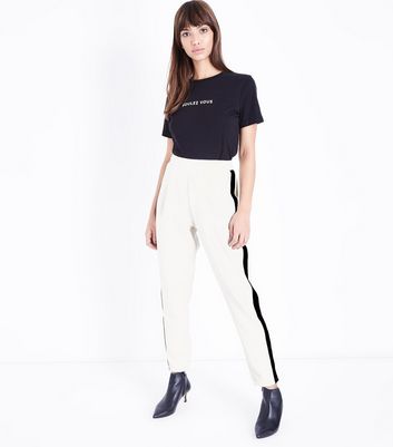 white trousers with black side stripe