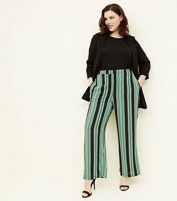 black trousers with green stripe