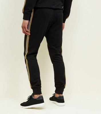black and yellow joggers mens