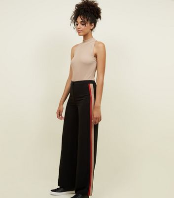 wide leg pants with stripe on side