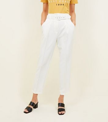 white tapered trousers