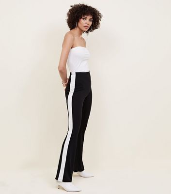 black trousers with white stripe