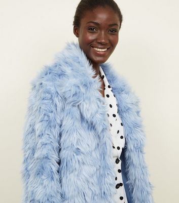 light blue faux fur coat
