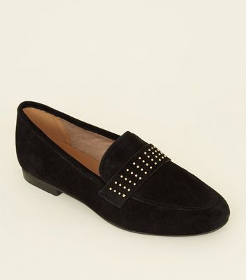 studded black loafers