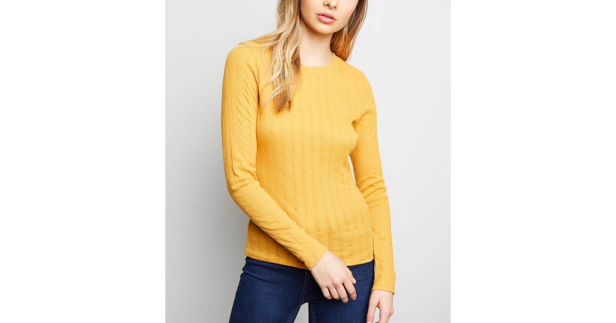 yellow longsleeve shirt