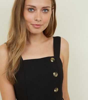 black buttoned jumpsuit