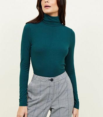 green polo neck top