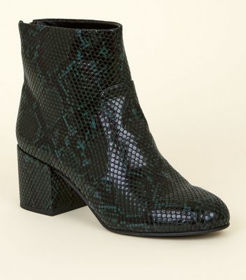 green snakeskin boots