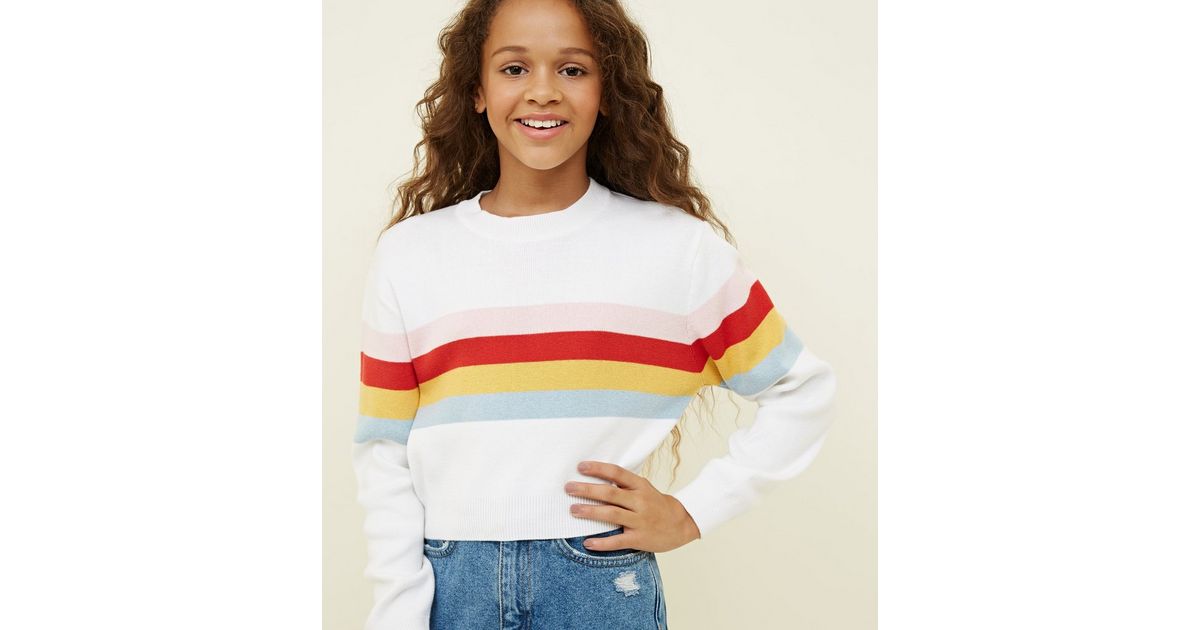 white jumper rainbow stripe