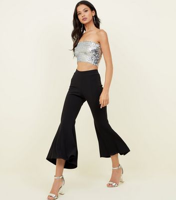 black kick flare trousers