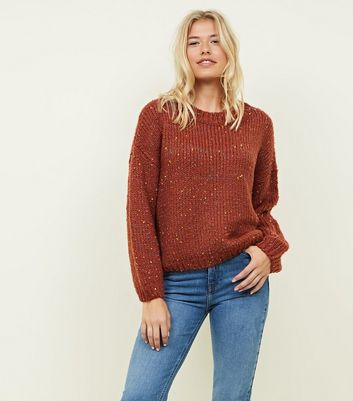 rust coloured knitwear