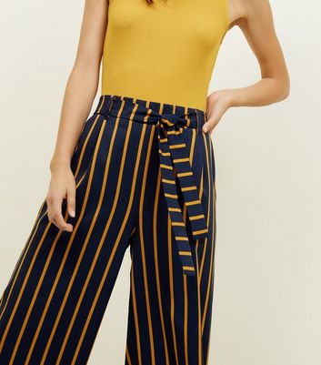 blue and yellow striped pants