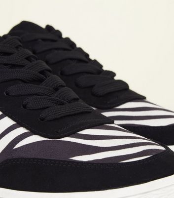 white heeled trainers
