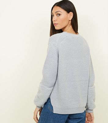 jumper with fur cuffs