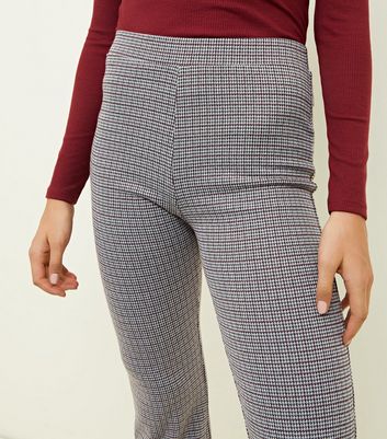 black cropped kick flare trousers