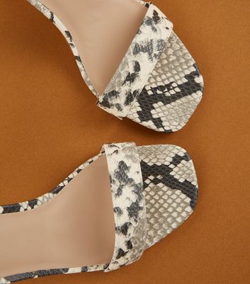 Graue High Heels mit Schlangenmuster und schmalem Graue High Heels mit Schlangenmuster und schmalem