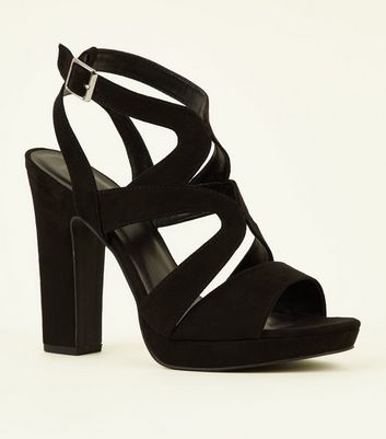 black strappy heels with platform