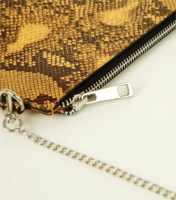 new look mustard clutch bag