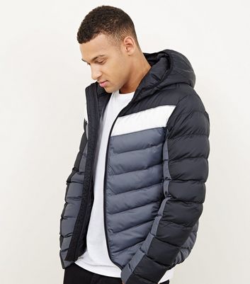 Schwarze, dicke Jacke mit Colour Blocking Design Für später speichern Von gespeicherten Artikeln entfernen Schwarze, dicke Jacke mit Colour Blocking Design Für später speichern Von gespeicherten Artikeln entfernen