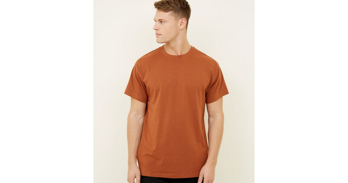 rust brown shirt